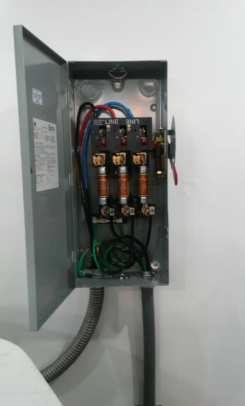 Three-phase disconnect switch installed for Smoke Detector Installation in Chatham